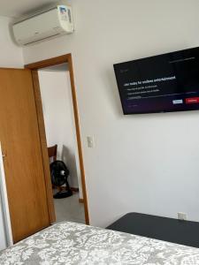 Piscina,sauna ,ar condicionado a 30passos da Bacutia