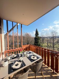 MySchluchseehome Gemütliche Ferienwohnung mit Südbalkon und Pool im Haus