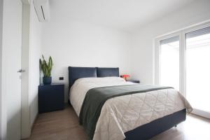 Loft Chic con Rooftop e parcheggio Privato a 2 minuti dalla metro A