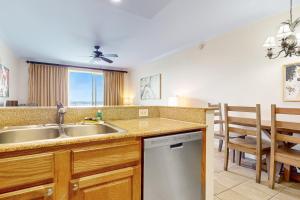 Lakefront condo with amazing views, pool, & hot tub - steps from the beach