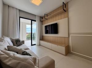 Invictus Residence 204 – Apartamento amplo com ar-condicionado em todos os cômodos, localizado próximo a comércios e a apenas 250 metros da praia