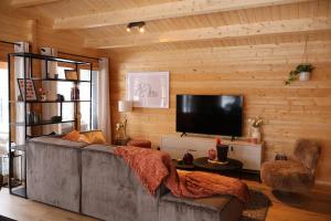 Luxe houten wellness boshuisje met Sauna