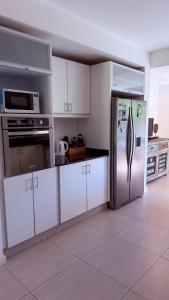 Casa con piscina en Estancias del Pilar, 3 dormitorios, jardín y parrilla