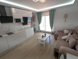 Beachfront penthouse with terrace in Sabinillas