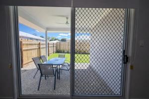 Solara Retreat - Modern 4BR Home with Backyard