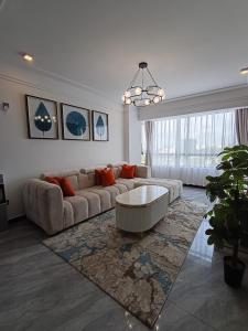 celestial stays two bedroom apartment with well equipped gym swimming pool and, ample parking space and proximity to major shopping malls