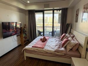 Sybay Suites okada Fountain lights and city view MSV 1105