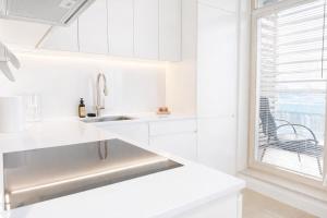 Design Penthouse with Private Sauna & Sunset Balcony