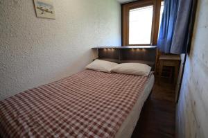 Résidence Pelvoux - Appartement pour 8 au coeur des Ménuires et ski aux pieds MAE-4394