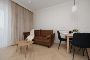 Elegant Apartment With Parking Space Near EXPO XXI In Warsaw by Noclegi Renters