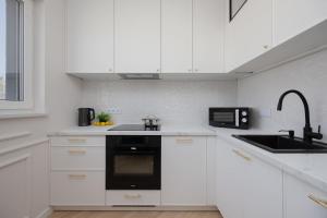 Elegant Apartment With Parking Space Near EXPO XXI In Warsaw by Noclegi Renters