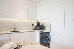 Modern 1BR in JVC with Pool & Gym Access