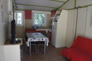 Complexes hoteliers Camping La Pinede : photos des chambres