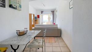 Studio front de mer terrasse wifi et clim