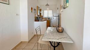 Studio front de mer terrasse wifi et clim