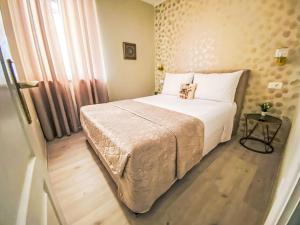 Apartment Partial sea & city view by Interhome