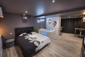 Suite de luxe Balnéo et Cinéma Le Saona