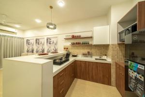 Golf Chateau Serviced Apartments, LODHA Belmondo