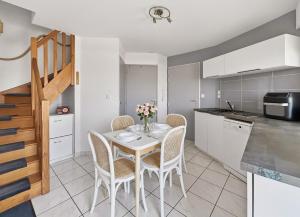 Appartement RDC avec terrasse et parking privé