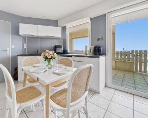 Appartement RDC avec terrasse et parking privé