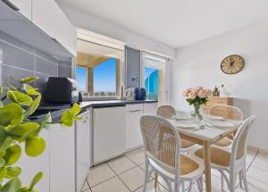 Appartement RDC avec terrasse et parking privé