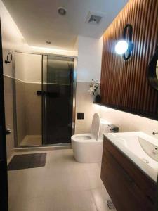 D Grey Pillows - 16th Floor One-Bedroom Condo Unit with Sea View