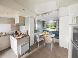 Mobil-home avec terrasse - 4 pers. - API-1-52-2164