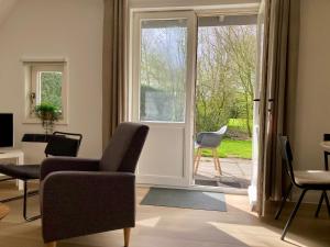 Olivia 6pers House with a private garden close to the National Park Lauwersmeer