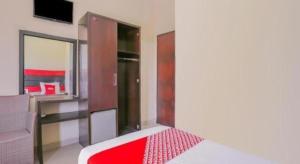 Hotel O Ari Beach Inn