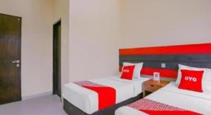 Hotel O Ari Beach Inn