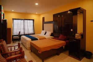 Syntilla Silver Cascade Inn - Near Silver Cascade Falls, Kodaikanal, Budget & Family Stay