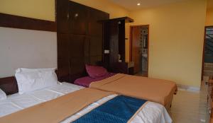 Syntilla Silver Cascade Inn - Near Silver Cascade Falls, Kodaikanal, Budget & Family Stay