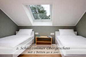 Ferienwohnung Feinheit - Gulfhof nahe Greetsiel mit Sauna, Garten & 3 Schlafzimmern