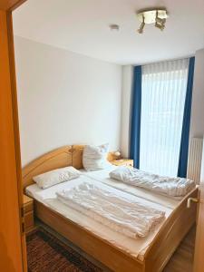 Apartment "Seerobbe" hundefreundlich mit Südbalkon, Sauna und Parkplatz - 200m zum Deich