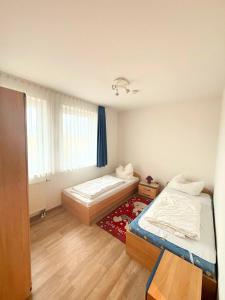 Apartment "Seerobbe" hundefreundlich mit Südbalkon, Sauna und Parkplatz - 200m zum Deich