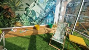 Appart cocooning proche du port-Véranda tropical