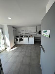 Studio con amenities zona Hospital Italiamo 42