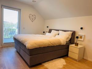 Neubau Wohnung mit Hauscharakter in Worms Weinsheim