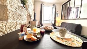 Coup de coeur T2 de charme Pierre apparente Centre