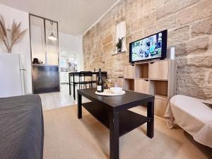 Coup de coeur T2 de charme Pierre apparente Centre