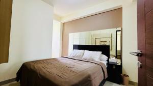 Homey 2BR Sudirman Suites Apartment