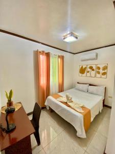 Alona Home near Alona Beach with 3 Bedrooms can accommodate up to6-15pax
