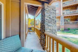 Stunning alpine escape with pool hot tub fireplace balcony & mountain views