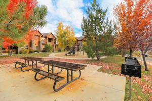 Stunning alpine escape with pool hot tub fireplace balcony & mountain views