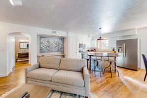 Stunning alpine escape with pool hot tub fireplace balcony & mountain views