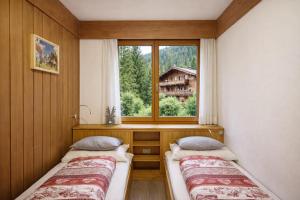 CASA 4 PIOPPI - 2 camere, balcone, garage Dolomiti Affitti