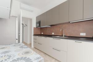 GuestHost - Atelier Rubens Milano de Angeli X4
