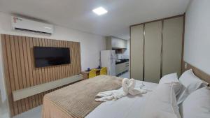 Flat à 5 min do Centrinho + Rooftop | VP205