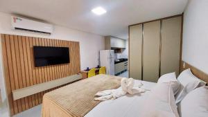 Flat à 5 min do Centrinho + Rooftop | VP205