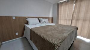 Flat à 5 min do Centrinho + Rooftop | VP205